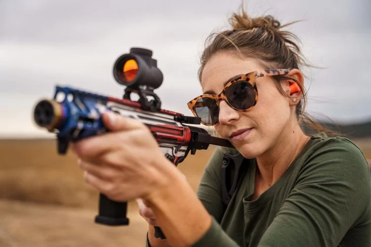 woman shooting AR pistol